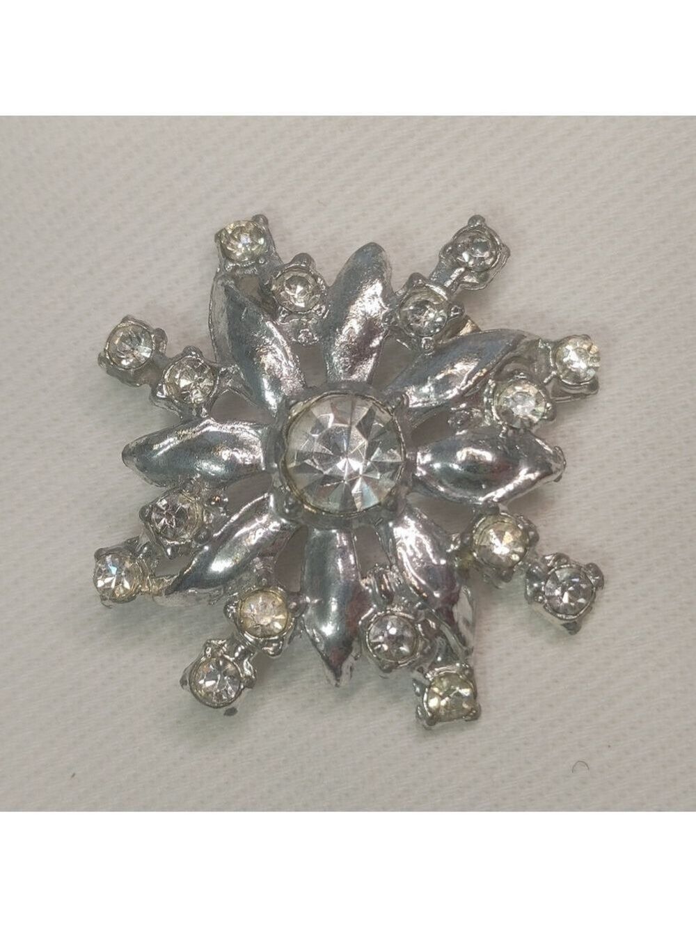 Elegant Silver Floral Starburst Brooch